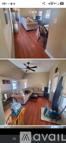 A living room with a couch, a chair, and a coffee table.