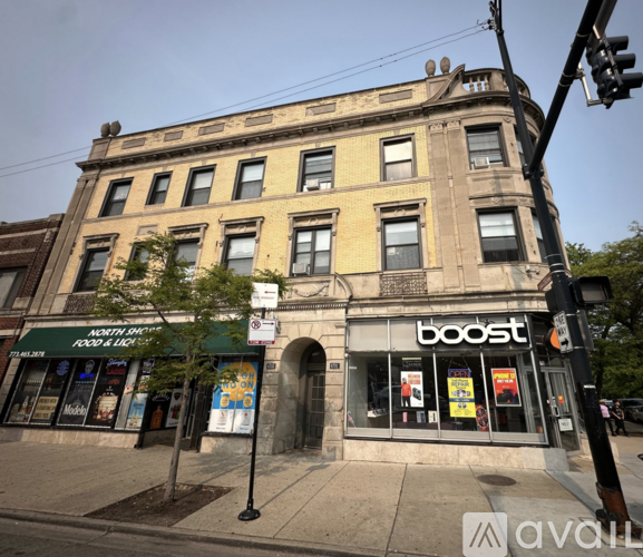 A street view of a building with a sign that says "boost".