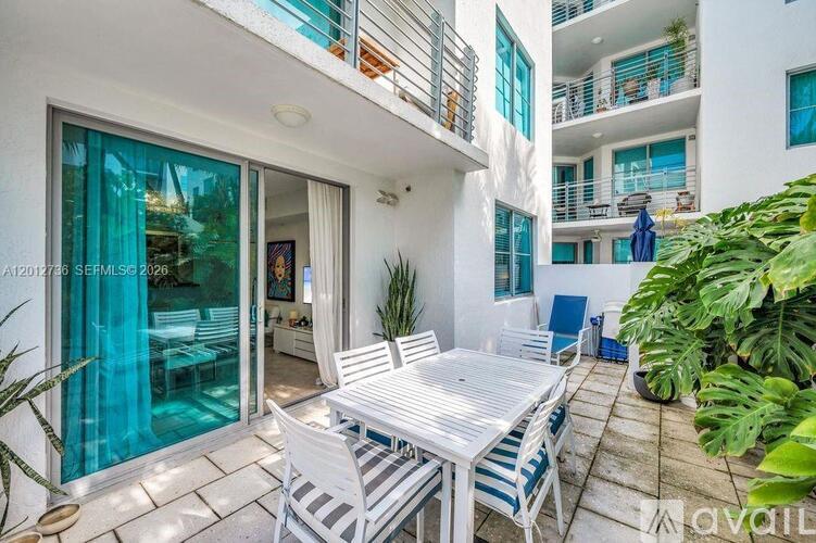 A patio with a table and chairs is available for rent.