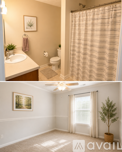 A bathroom with a toilet, sink, and shower.