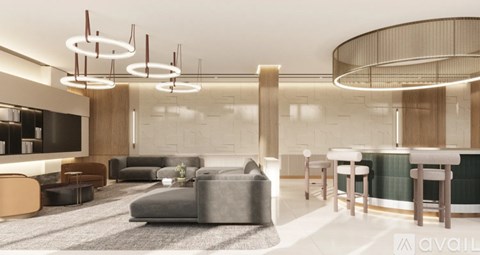 A modern living room with a grey sofa and wooden furniture.