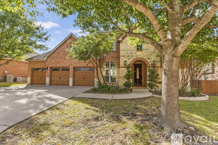 A house with a tree in front of it.