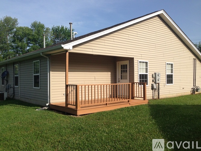 A house with a porch and a covered entrance.