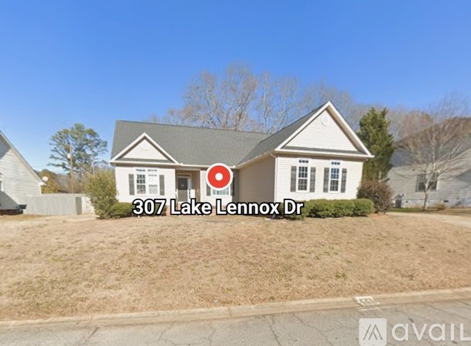 A house with the address 307 Lake Lennox Dr is for sale.