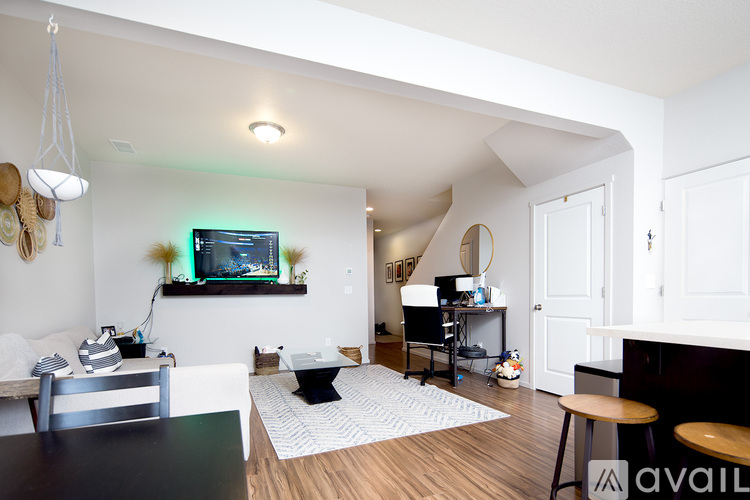 A living room with a television and a fish tank.