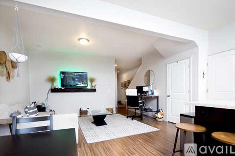 A living room with a television and a fish tank.
