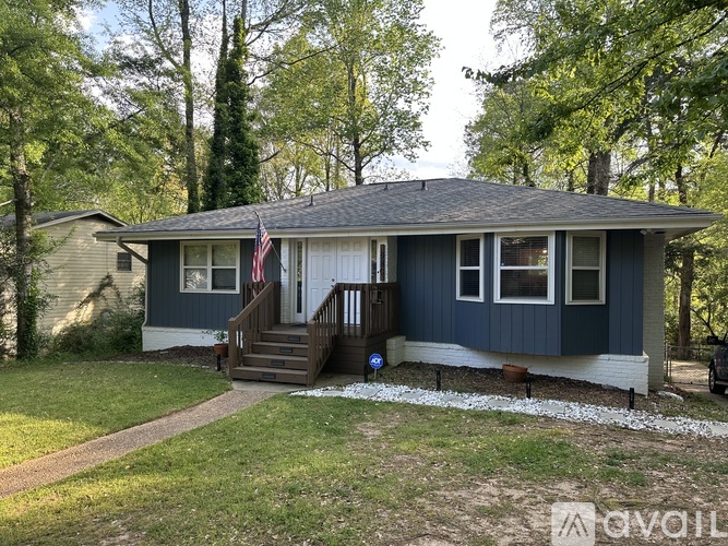 A house with a flag on the front porch.