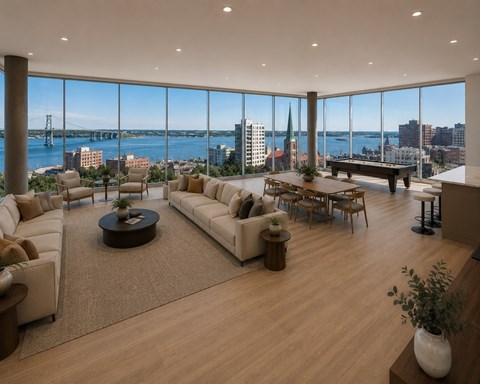 A living room with a view of the city skyline.