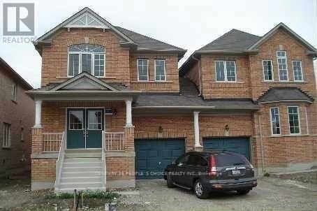 A red sign that says Legal Basement Apartment.