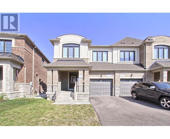 A house with a car parked in front.