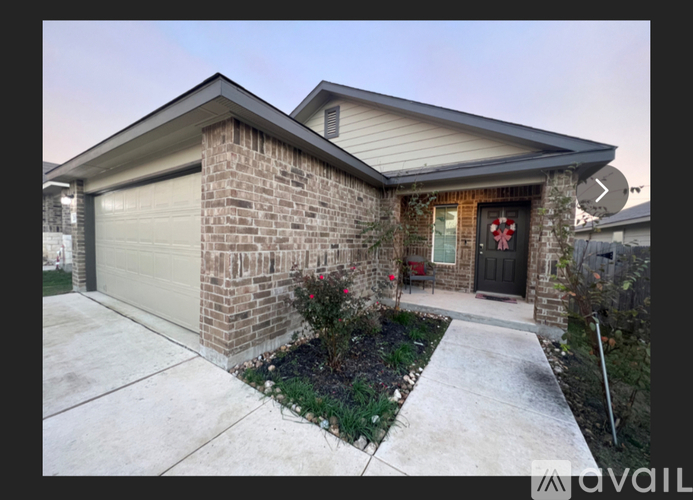 A house with a garage and a driveway.