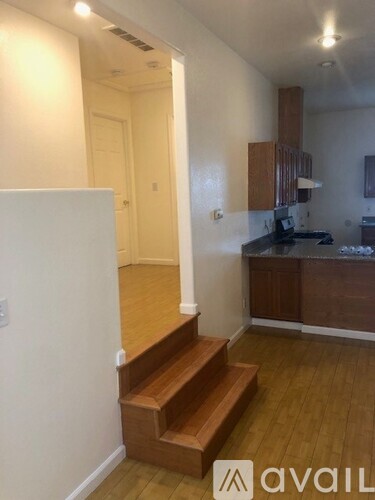 A white door is in the hallway.