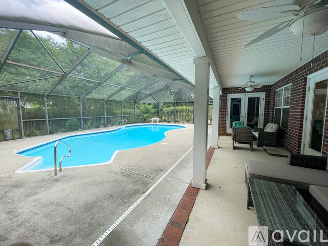 A pool under a glass roof.