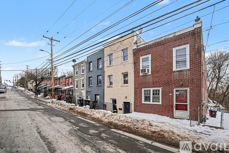 A row of houses with a street in between.