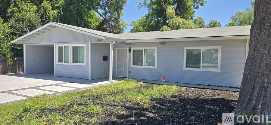 A house with a garage is available for rent.