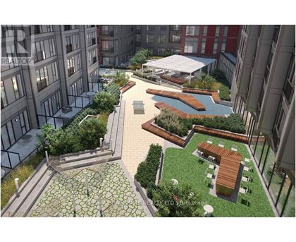 A modern outdoor area with a pool and seating area.
