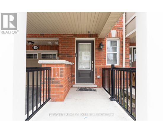A black door with a glass window is on the right side of the image.
