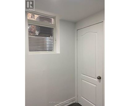 A white door is on the right side of the image.
