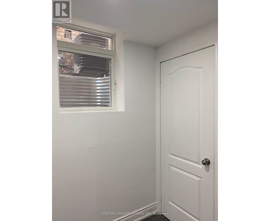 A white door is on the right side of the image.