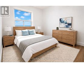 A bedroom with a large bed, a nightstand, and a dresser.