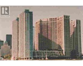 A cityscape with skyscrapers and a bridge in the background.