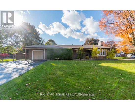 A house with a lawn in front of it is for sale.