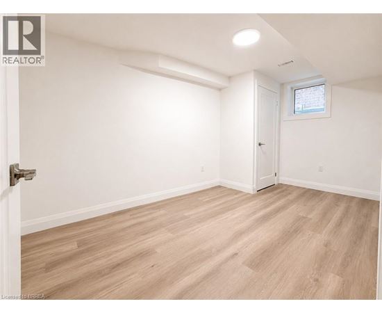 A room with a door and a window.
