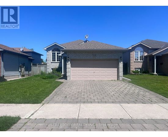 A house with a garage is for sale by Streetcity Realty.