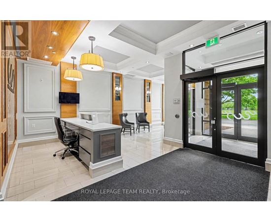 A brokerage office with a desk and chairs.