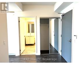 A room with a doorway leading to another room.
