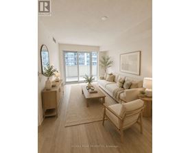 A well-lit living room with a couch, chair, and coffee table.