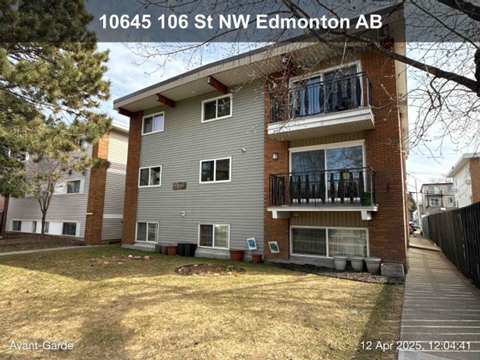 A two-story building with a balcony on the second floor is located at 10645 106 St NW Edmonton AB.