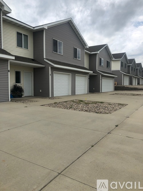 A row of houses with the word AVAIL on the bottom right.