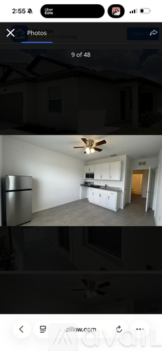 A photo gallery app displaying a series of images of a room.