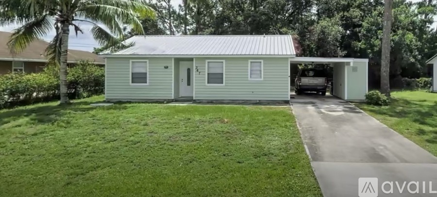 A small house with a garage is available for rent.