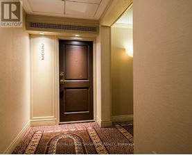 A hallway with a door and a sign that says "NOOK".