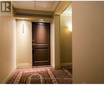A hallway with a door and a sign that says "NOOK".