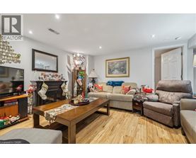 A living room with a fireplace and a couch.