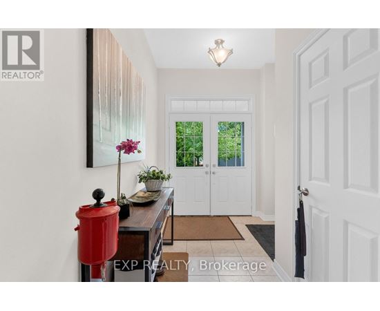 A white door with a black handle is on the right side of the image.