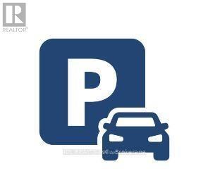 A blue and white parking sign with a car underneath it.