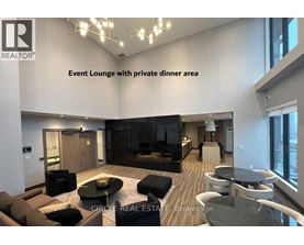 A modern event lounge with a private dining area.