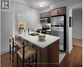 A kitchen with a white countertop and brown chairs.