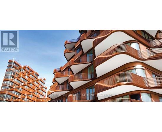 A tall building with a curved design is in the background, while a smaller building with balconies is in the foreground.
