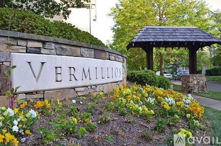 A sign that says "Vermillion" is in front of a gazebo.