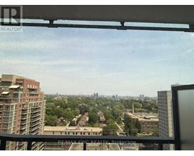 A view of a cityscape from a high-rise building.