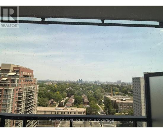 A view of a cityscape from a high-rise building.