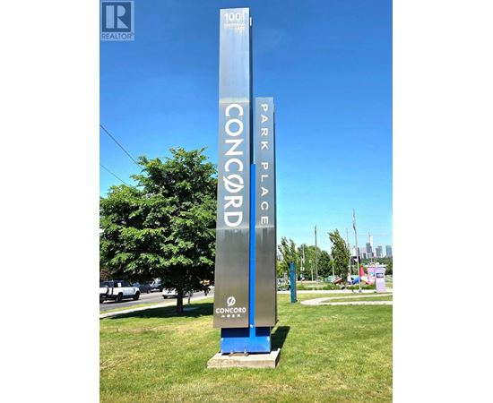 A tall blue and silver sign that says Concord Park Place.