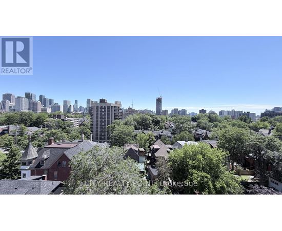 A cityscape with a mix of residential and commercial buildings.