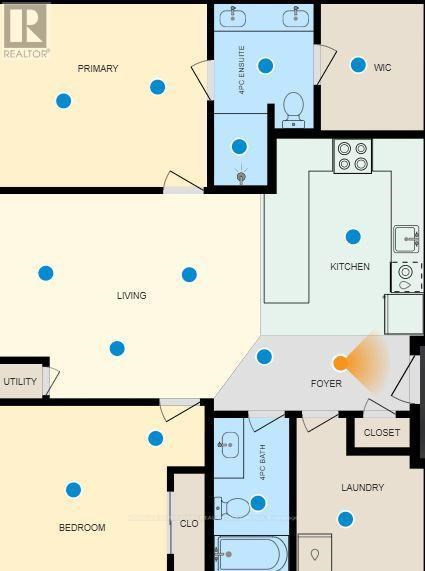 A floor plan of an apartment with a primary bedroom, living room, utility room, and a cloakroom.