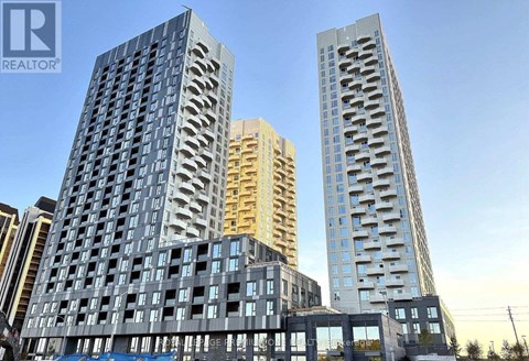 Three tall buildings with balconies are shown in the image.